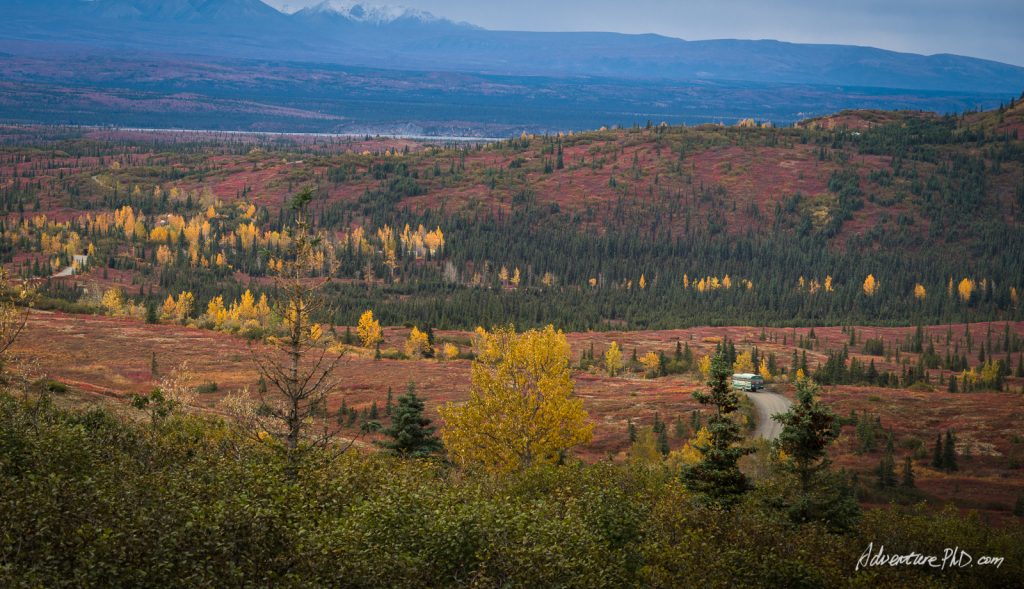 Camper bus driving to the Wonder Lake Campground in the Denali National Park, Alaska, USA