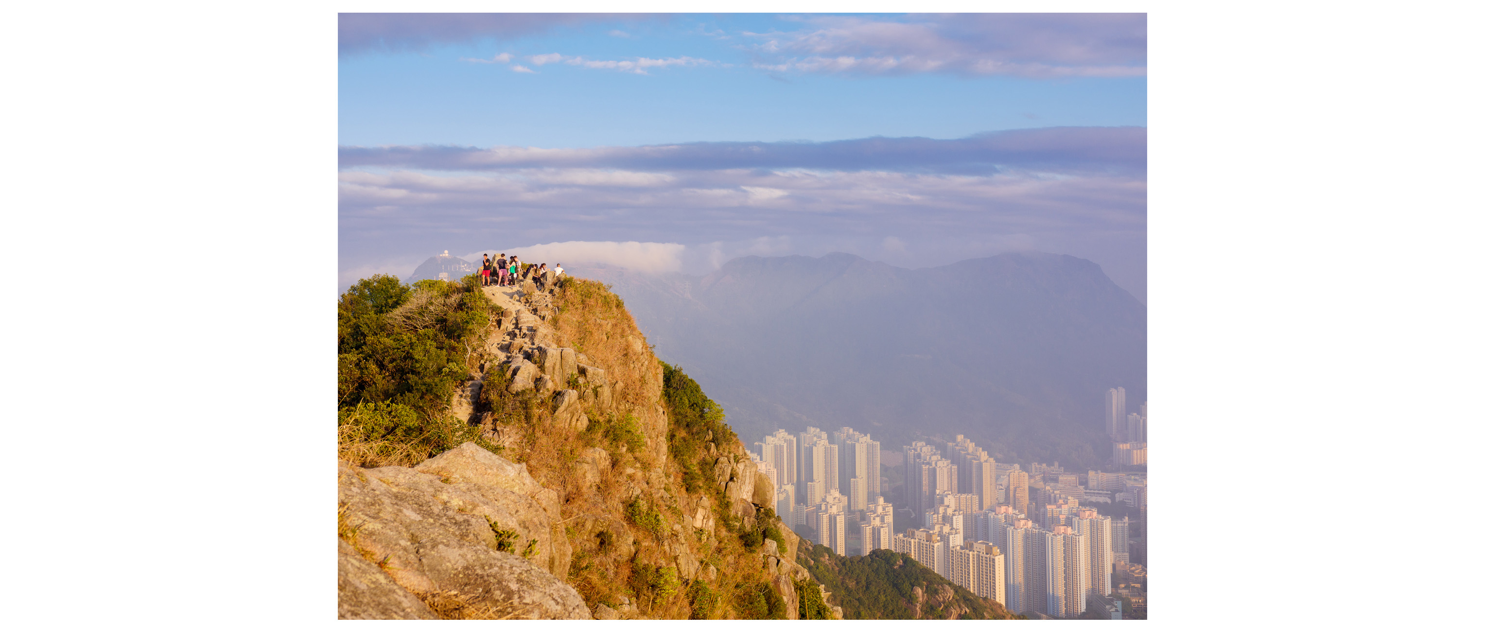 Hikers at the top of Lion Rock